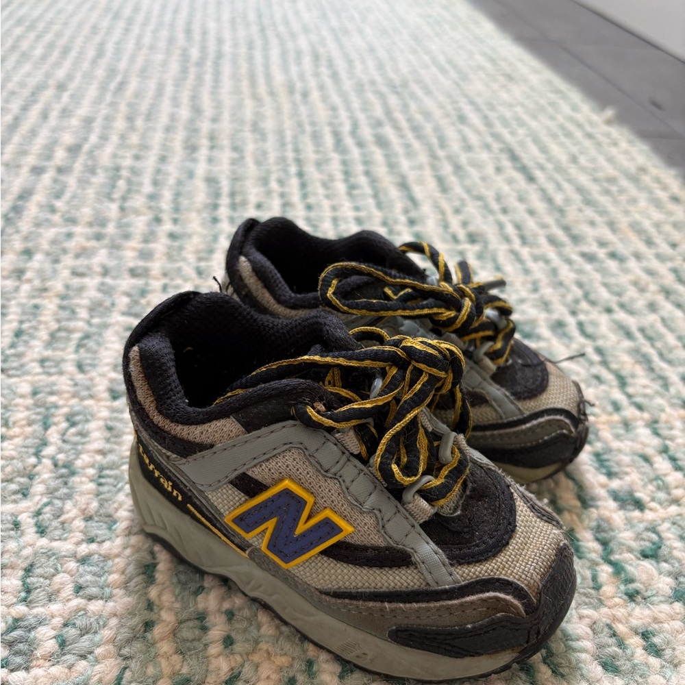New Balance Black and Blue Sneakers with Dynamic Design